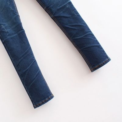 Jeans skinny moulant avec poche en tissu tie dye taille basse