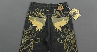 Jeans baggy large avec motif or brodé sur arrières