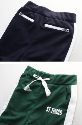Pantalon de survetement avec imprimé et bande verticales