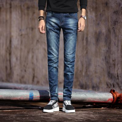 Jeans skinny pour homme avec effet éclaboussure de peinture blanche