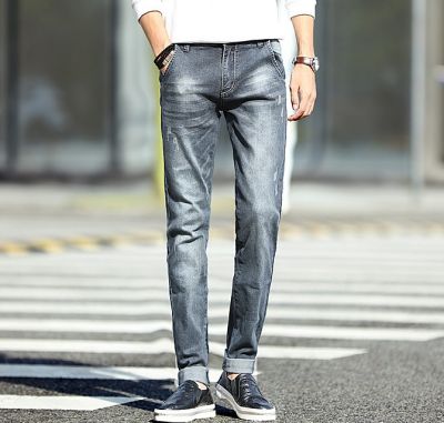 Jeans slim pour homme bleu-gris avec détails griffures