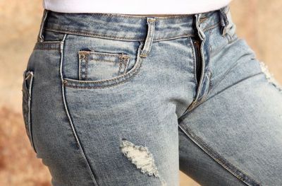 Jeans Slim Skinny pour Femme Taille Basse avec Déchirures Effet Délavé