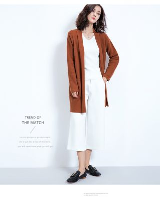 Long gilet pour femme en laine avec poches côté