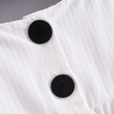 T-shirt léger été pour femme avec détail dentelle épaule et boutons au dos